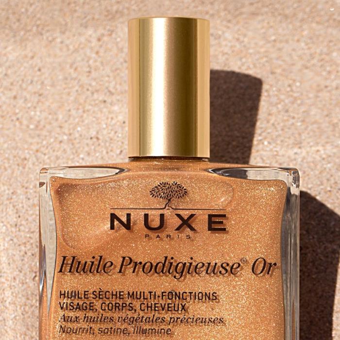 NUXE Huile Prodigieuse Or Shimmering sausā eļļa ādas mirdzumam (sejas un ķermeņa aprūpei) 50 ml