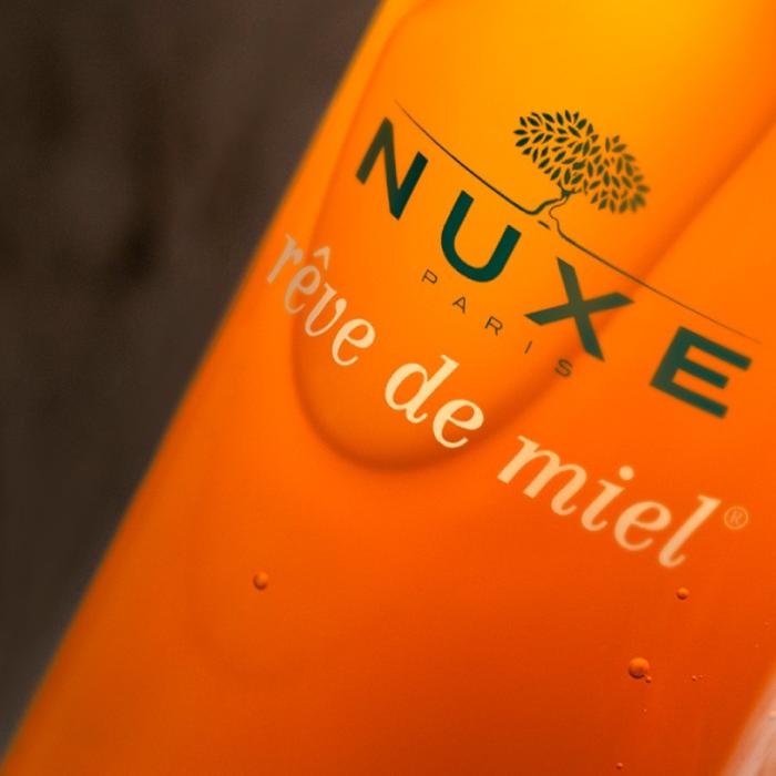 NUXE Reve de Miel attīroša un dekoratīvo kosmētiku noņemoša želeja sejai 200 ml